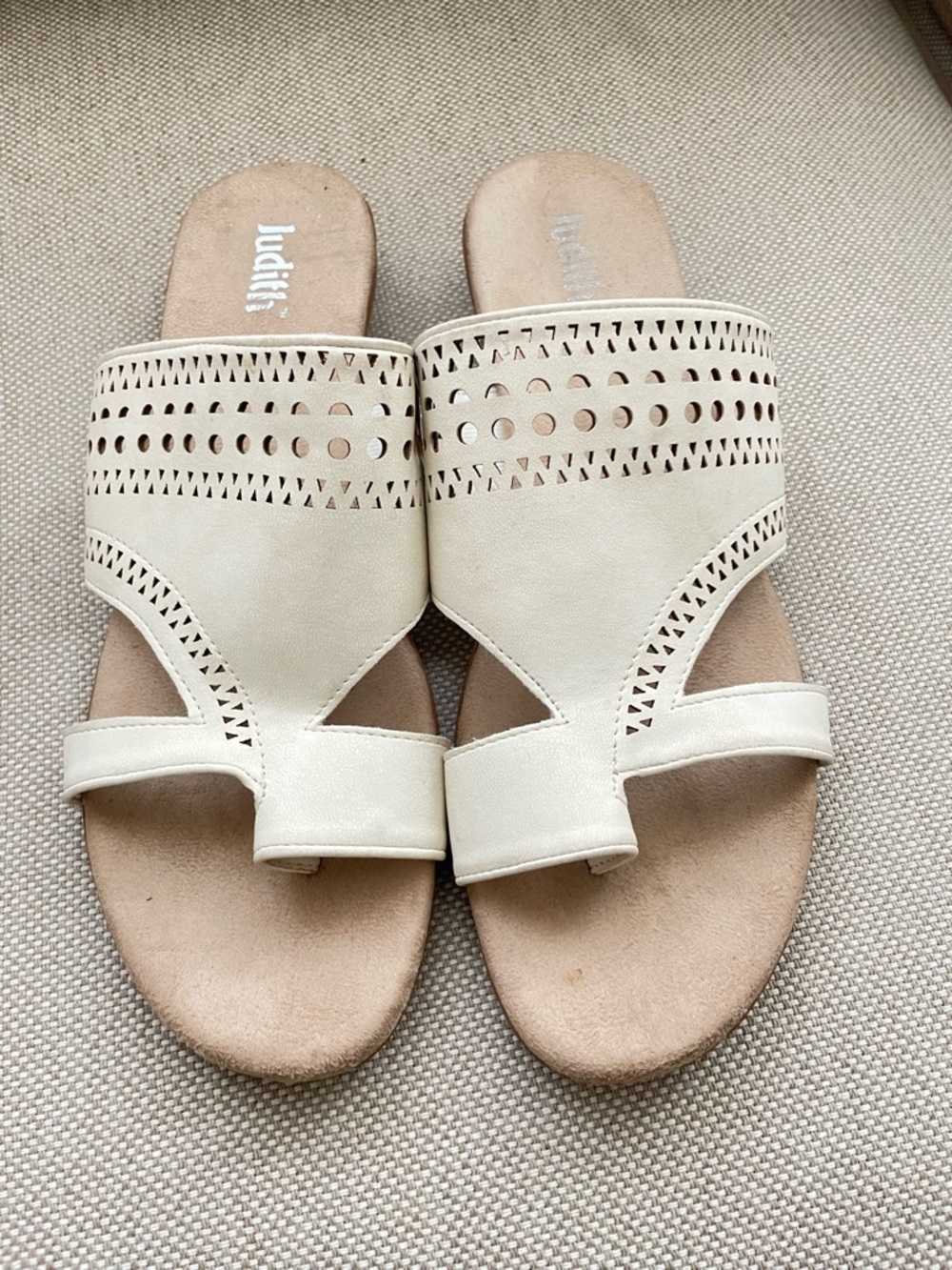 White Laser-Cut Leather Slide Sandals by Judith.